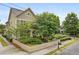 Charming home exterior with a picket fence, lush landscaping, and inviting curb appeal at 1184 Medlin Se St, Smyrna, GA 30080
