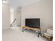 Cozy living room/hall area with carpet and TV at 1184 Medlin Se St, Smyrna, GA 30080