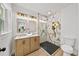 Modern bathroom with a double vanity, patterned tile shower, and stylish fixtures at 1366 Allegheny Sw St, Atlanta, GA 30310
