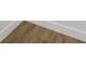 Close-up of hardwood floors with white baseboards at 1366 Allegheny Sw St, Atlanta, GA 30310