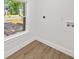 Bright laundry room with a window that allows natural light into the room at 1366 Allegheny Sw St, Atlanta, GA 30310