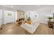 Bright living room featuring a modern fireplace, hardwood floors, and neutral decor at 1366 Allegheny Sw St, Atlanta, GA 30310