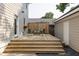 Wooden deck with outdoor seating, flower box, and privacy fence at 178 Mayson Ne Ave, Atlanta, GA 30307