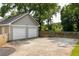 This detached two-car garage is situated on a large concrete parking area at 178 Mayson Ne Ave, Atlanta, GA 30307
