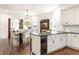 Kitchen view from the island into the dining area; note the white cabinets at 178 Mayson Ne Ave, Atlanta, GA 30307