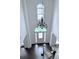 Grand foyer featuring a high ceiling, a chandelier, and a staircase with dark wood floors at 1991 Westover Nw Ln, Kennesaw, GA 30152