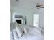 Spacious primary bedroom with fan, sitting area, fireplace, and ensuite bathroom at 1991 Westover Nw Ln, Kennesaw, GA 30152