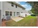 The backyard of this home has a patio with privacy fences and green lawns at 2357 Heritage Park Nw Cir # 17, Kennesaw, GA 30144