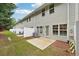 This home's backyard patio looks out onto a green lawn with privacy fences at 2357 Heritage Park Nw Cir # 17, Kennesaw, GA 30144