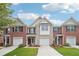 This townhome boasts a brick facade, attached garage, and well-maintained landscaping at 2357 Heritage Park Nw Cir # 17, Kennesaw, GA 30144