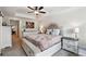 Inviting main bedroom with a tray ceiling, soft carpet, and tasteful decor at 2357 Heritage Park Nw Cir # 17, Kennesaw, GA 30144