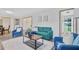 Bright living room showcases modern furnishings, neutral decor, and hardwood flooring at 5488 Janice Ln, Stone Mountain, GA 30087