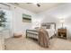 Bright bedroom with a comfortable bed, neutral decor, and natural light at 1363 Cooper Springs Rd, Grayson, GA 30017