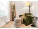 Cozy living room featuring a comfortable chair and stylish decor at 1363 Cooper Springs Rd, Grayson, GA 30017