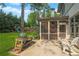 Grilling station located right next to a screened in porch, overlooking the yard and play set at 1894 Dyer Cir, Atlanta, GA 30341