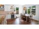 Bright breakfast nook with a wine cooler, lots of natural light and view of the yard at 1894 Dyer Cir, Atlanta, GA 30341