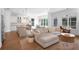 Open concept living room flows into the kitchen with a large island and stainless steel appliances at 1894 Dyer Cir, Atlanta, GA 30341