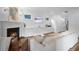 Comfortable living room featuring a cozy fireplace, built-in shelving, and neutral decor at 1894 Dyer Cir, Atlanta, GA 30341