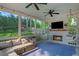 Enjoy this relaxing screened porch, complete with a brick fireplace and hanging chairs at 1894 Dyer Cir, Atlanta, GA 30341