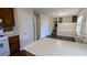 Open kitchen with breakfast bar overlooking the living area at 2015 Corners Cir, Lithonia, GA 30058