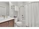 Modern bathroom with a shower-tub combo and vanity with a white countertop at 345 Glen Iris Ne Dr # 3, Atlanta, GA 30312
