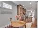 Cozy breakfast nook area, with table and chairs, adjacent to the modern kitchen at 345 Glen Iris Ne Dr # 3, Atlanta, GA 30312