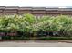 Charming brick townhomes lined with flowering trees and manicured hedges at 345 Glen Iris Ne Dr # 3, Atlanta, GA 30312
