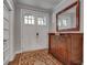 Open foyer with wood floors, antique cabinet, and staircase at 345 Glen Iris Ne Dr # 3, Atlanta, GA 30312