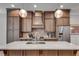 Modern kitchen with stainless steel appliances and quartz countertop island at 345 Glen Iris Ne Dr # 3, Atlanta, GA 30312
