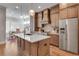 Open kitchen with stainless steel appliances and hardwood floors at 345 Glen Iris Ne Dr # 3, Atlanta, GA 30312