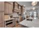 Updated kitchen with stainless steel appliances and quartz countertop island at 345 Glen Iris Ne Dr # 3, Atlanta, GA 30312