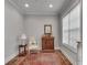 Cozy sitting area with stylish furniture, ornate bureau and hardwood floors at 345 Glen Iris Ne Dr # 3, Atlanta, GA 30312