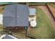 Aerial view of the backyard showing a patio area, seating and green space at 382 Winston Circle Cir, Canton, GA 30114