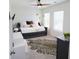 Bright bedroom features modern decor, large mirror, and unique floor rug at 382 Winston Circle Cir, Canton, GA 30114