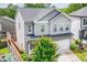 Well-maintained home featuring a two-car garage, manicured landscaping, and a classic design at 382 Winston Circle Cir, Canton, GA 30114