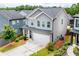 Beautifully landscaped home with a two-car garage and inviting curb appeal at 382 Winston Circle Cir, Canton, GA 30114