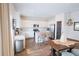 Bright, modern kitchen with white cabinetry, stainless appliances, and island seating at 382 Winston Circle Cir, Canton, GA 30114
