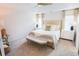 Bright bedroom with a tray ceiling, neutral tones, carpet, and ample natural light at 382 Winston Circle Cir, Canton, GA 30114