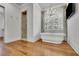 Spa-like bathroom with freestanding tub, glass shower, and plenty of natural light at 710 Cox Rd, Roswell, GA 30075