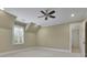 Neutral bedroom offers a serene retreat with plush carpeting and ample natural light at 710 Cox Rd, Roswell, GA 30075