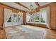 Open dining area features exposed brick, hardwood floors and lots of natural light at 710 Cox Rd, Roswell, GA 30075