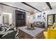Bright living room with modern furnishings and a cozy atmosphere, featuring hardwood floors and neutral decor at 8255 Habersham Waters Rd, Atlanta, GA 30350