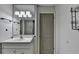 The bathroom features a single sink and mirrored vanity at 3650 Ashford Dunwoody Rd, Ne, #923 # 923, Atlanta, GA 30319