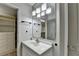 This bathroom offers a single sink and mirrored vanity at 3650 Ashford Dunwoody Rd, Ne, #923 # 923, Atlanta, GA 30319