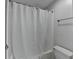 A full bathtub and a toilet are featured in this bathroom at 3650 Ashford Dunwoody Rd, Ne, #923 # 923, Atlanta, GA 30319