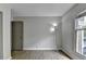 Bedroom featuring wood floors, doorway, neutral colored walls and natural light at 3650 Ashford Dunwoody Rd, Ne, #923 # 923, Atlanta, GA 30319