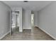This bedroom showcases wood floors and an open closet at 3650 Ashford Dunwoody Rd, Ne, #923 # 923, Atlanta, GA 30319