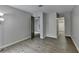 This bedroom showcases wood floors and an open closet at 3650 Ashford Dunwoody Rd, Ne, #923 # 923, Atlanta, GA 30319