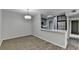 Open concept kitchen features stainless steel appliances and hardwood style floors at 3650 Ashford Dunwoody Rd, Ne, #923 # 923, Atlanta, GA 30319