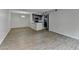 Open living area with stylish floors, dark cabinetry and breakfast bar at 3650 Ashford Dunwoody Rd, Ne, #923 # 923, Atlanta, GA 30319